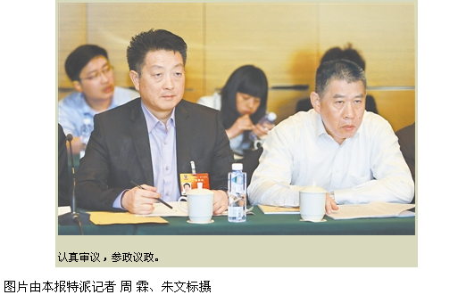江西日报3月12日A03版.png
